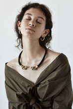 Load image into Gallery viewer, FLEXIBLE ROPE NECKLACE WITH BRASS KNOT DETAIL
