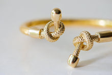 Load image into Gallery viewer, GOLD PLATED DOUBLE KNOT BANGLE
